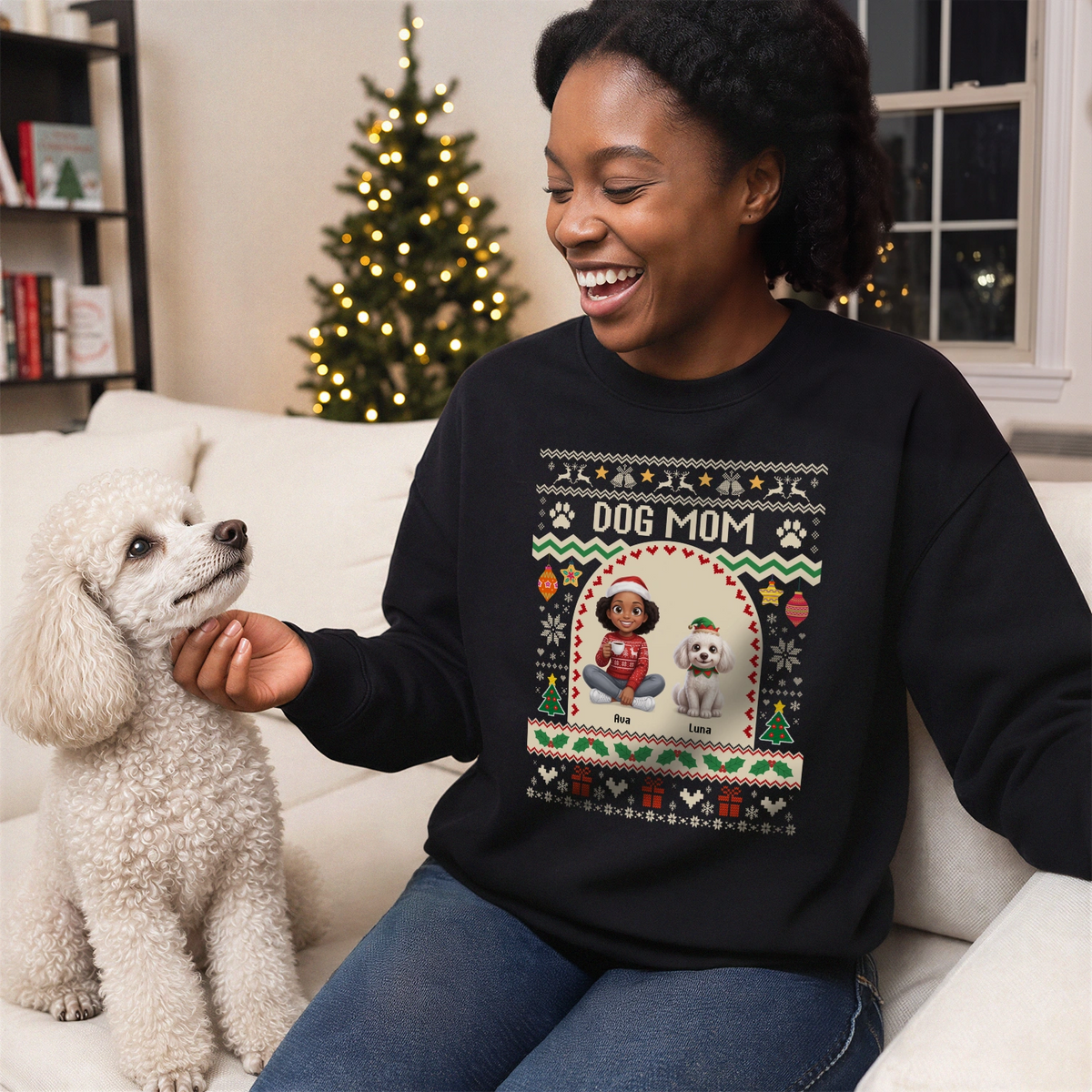 Woman in a black Dog Mom Christmas sweater with a cartoon of herself and her poodle