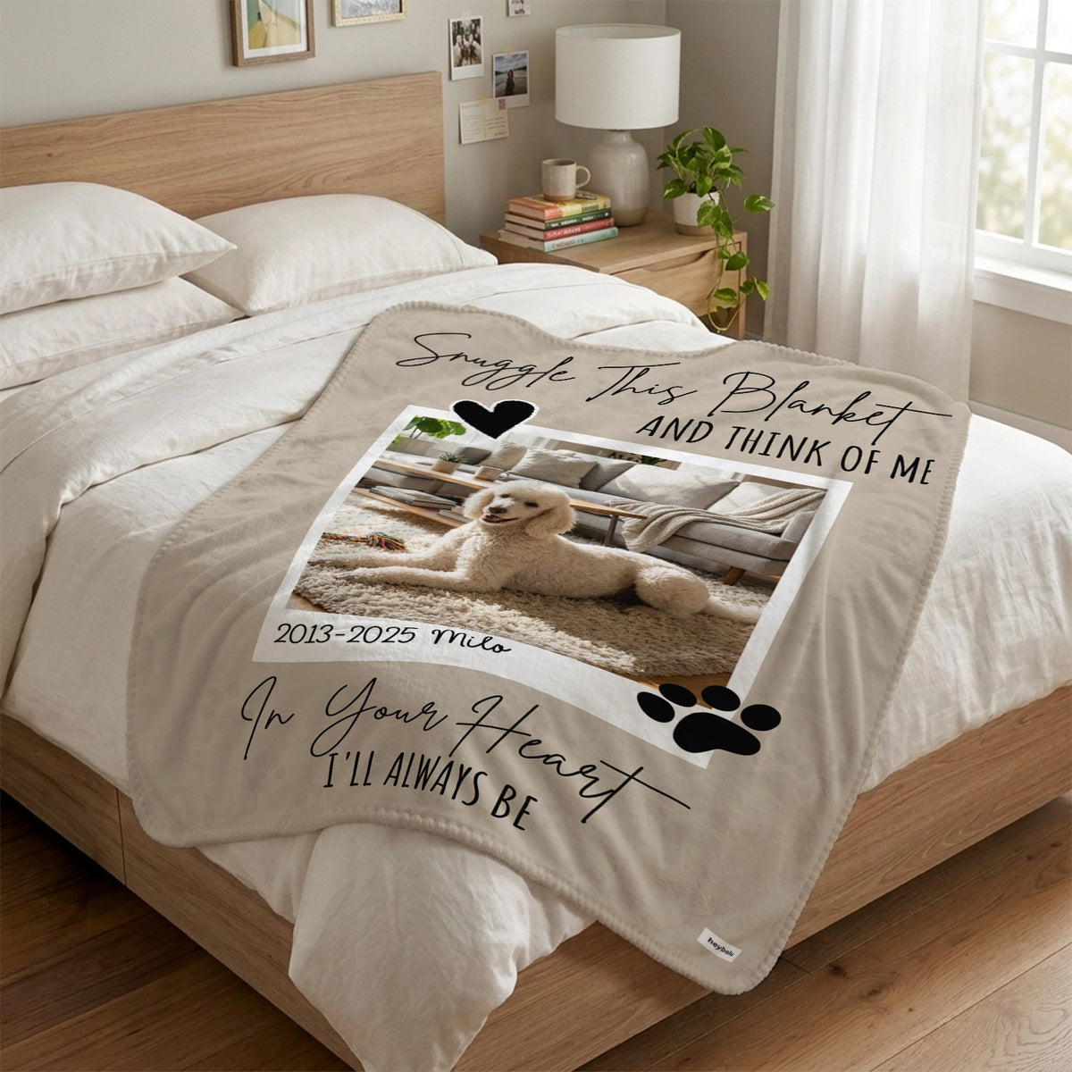 Dog Memorial blanket with a white poodle photo spread across the bed