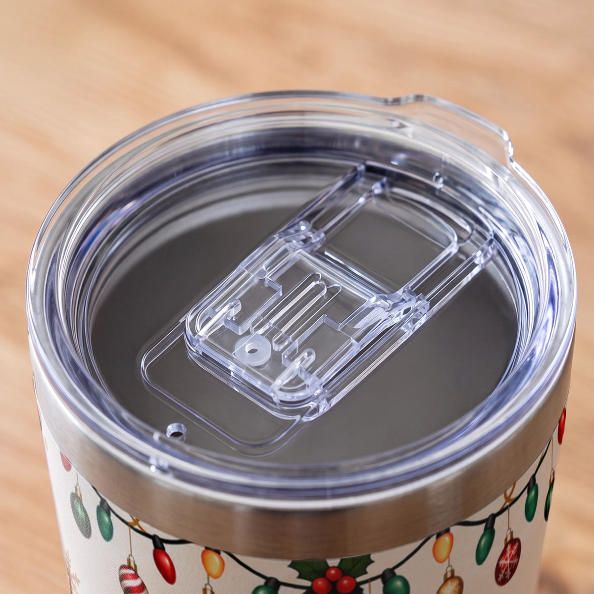 Close-up of the clear slide lid on the insulated 20 oz tumbler