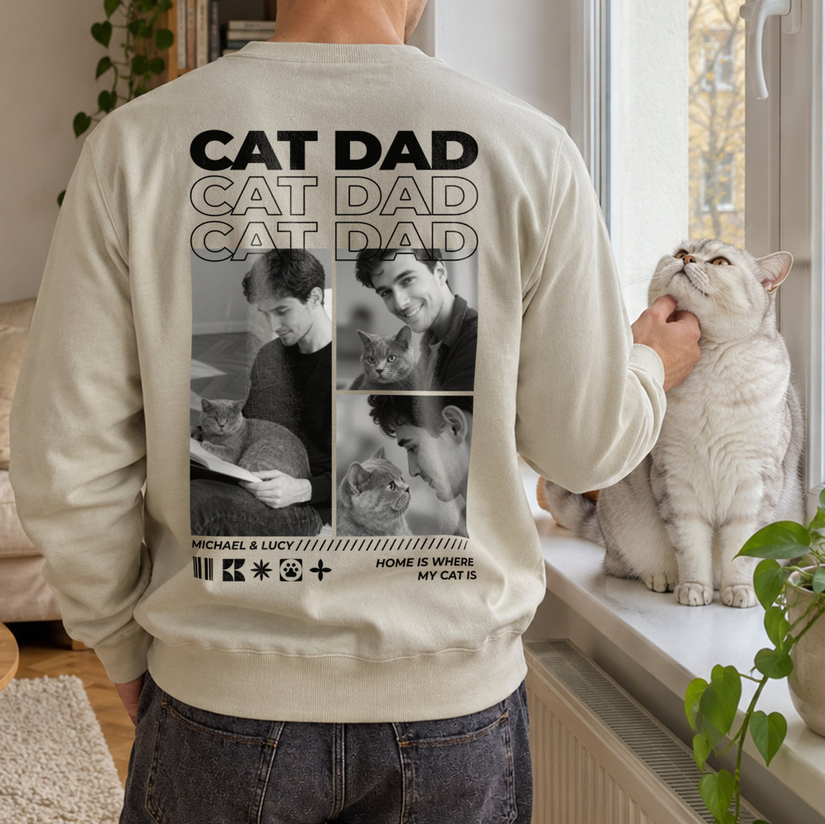 Beige Cat Dad sweater back with photo collage while a white cat is petted at the window