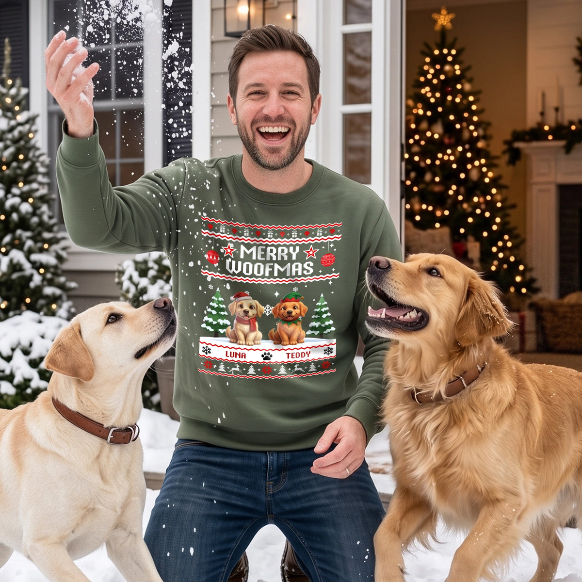 Man in a military green Merry Woofmas sweater with two dogs in the snow
