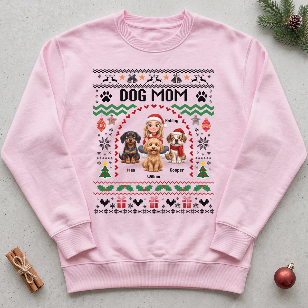 Light pink Dog Mom sweater with cartoon woman and three dogs with names