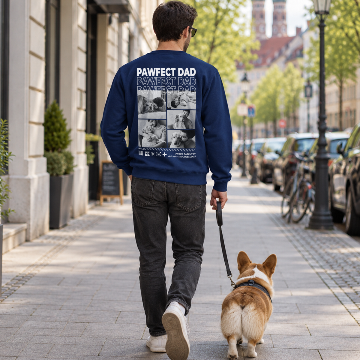 Man walking his Corgi in a navy Pawfect Dad sweater with a four-photo collage
